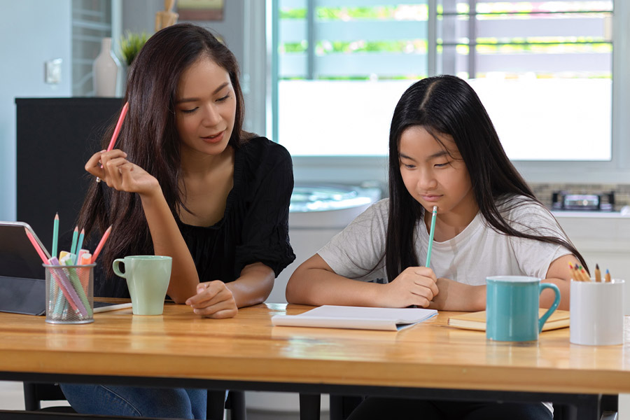 student and tutor together at a desk in Glendale